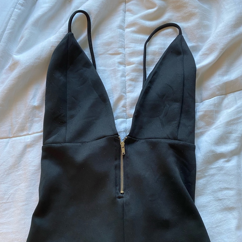 Deep cut black bodysuit